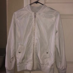 white windbreaker